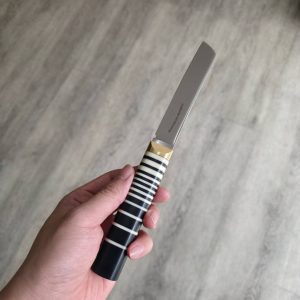 Florentine Eastern Table knife Ivory to Black gradient Brass bloster